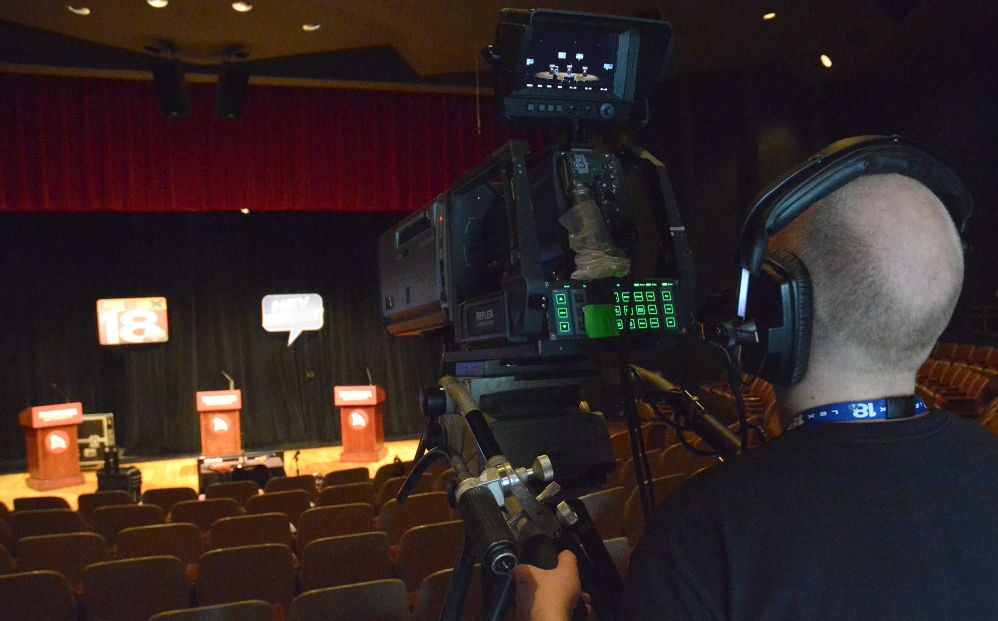 man behind tv camera