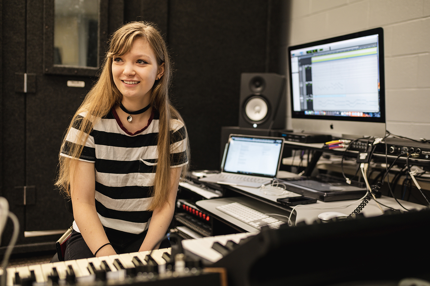 Emily Nance in front of a keyboard