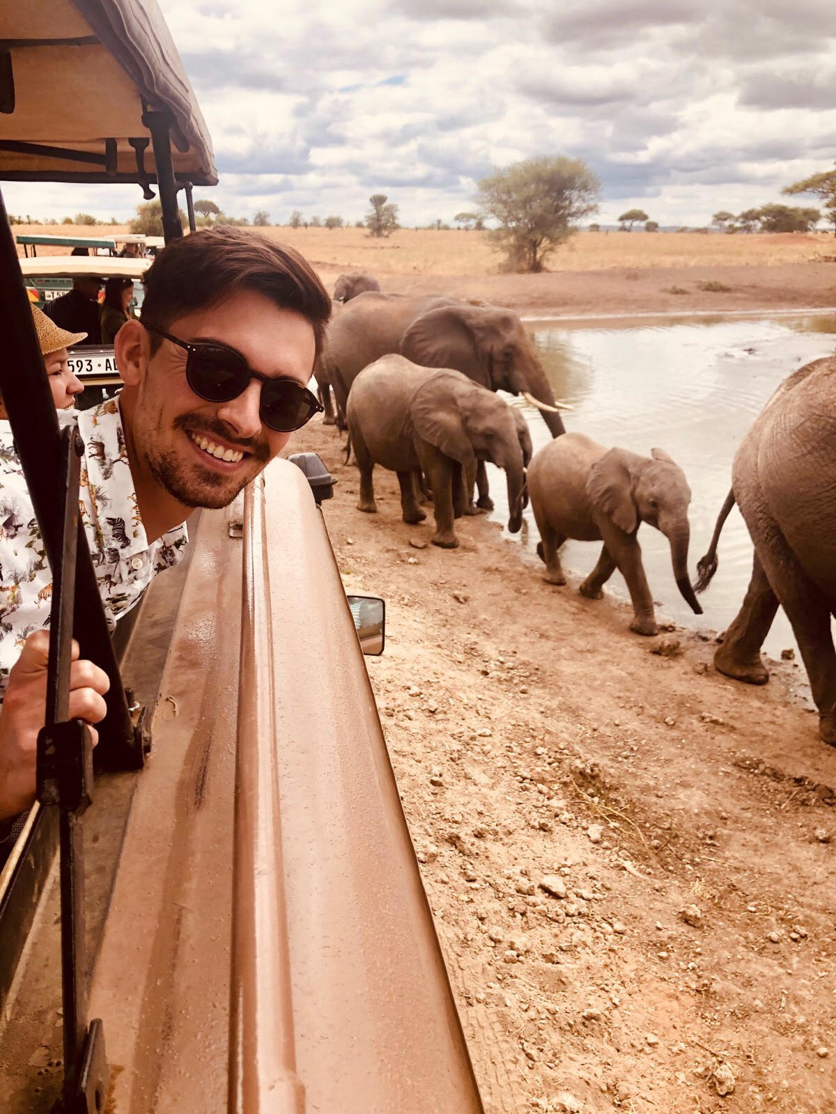 riding past elephants