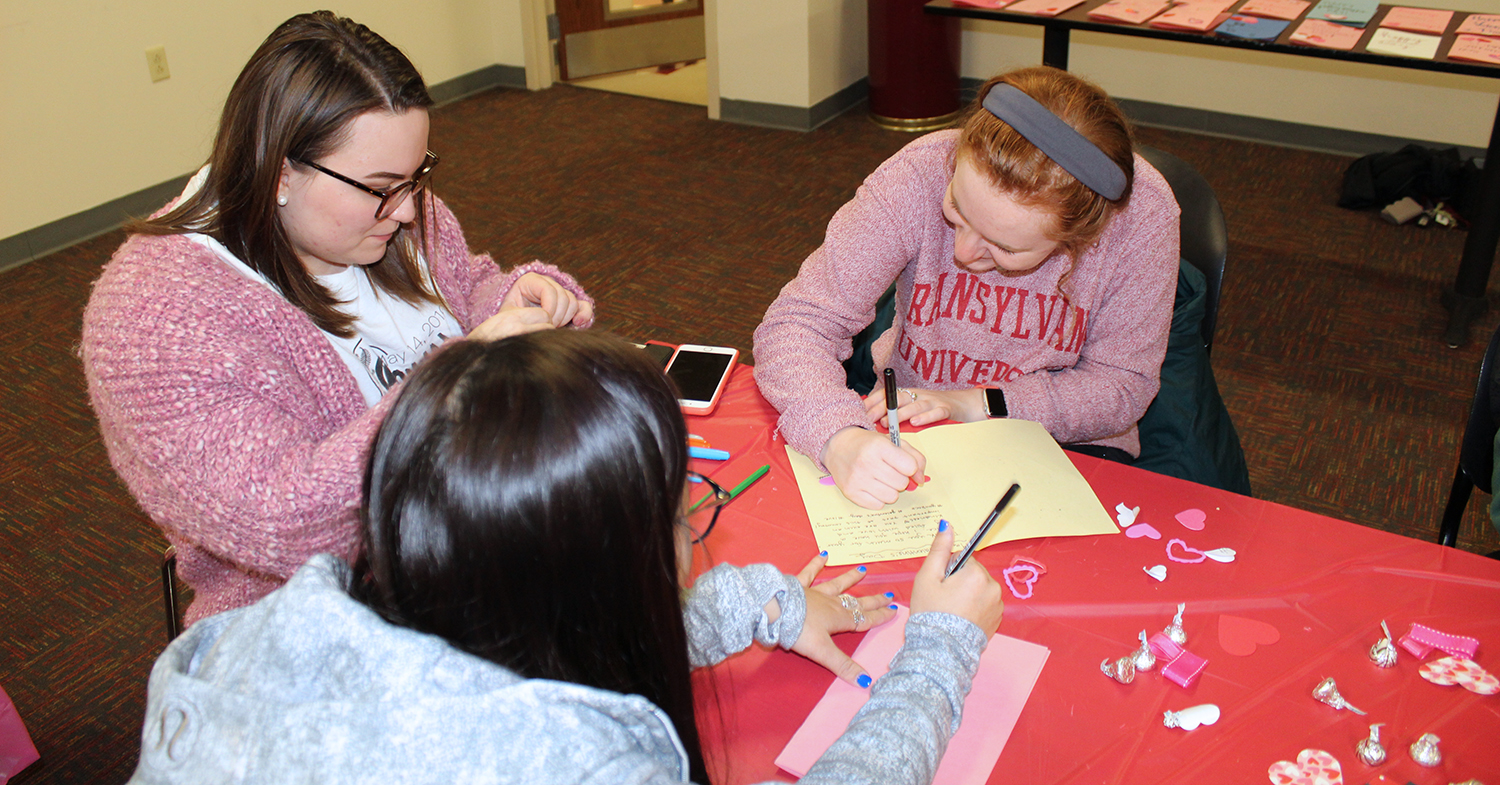 making valentines at a table