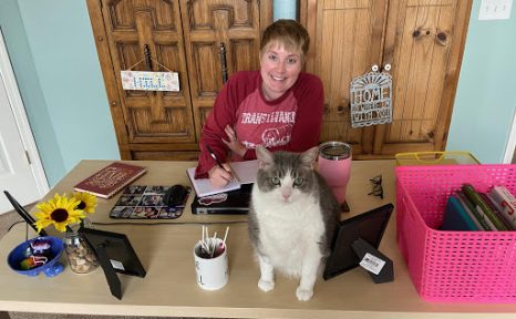 Ashley Hill and a cat