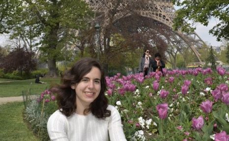 Student in front of Eiffel Tower