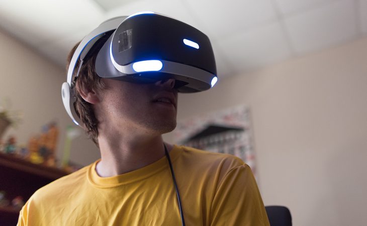 student wearing virtual reality headset