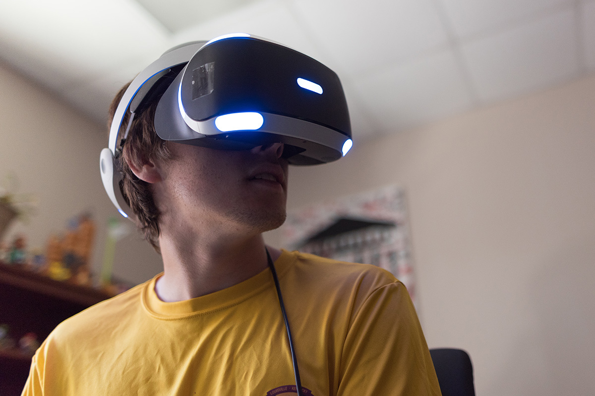 student wearing virtual reality headset