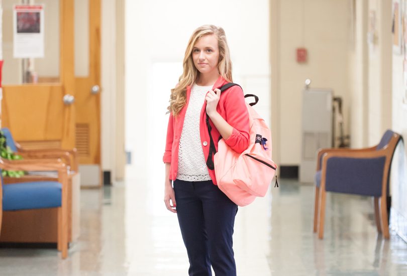 student with backpack