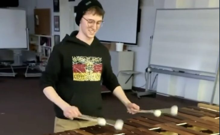 student playing marimba