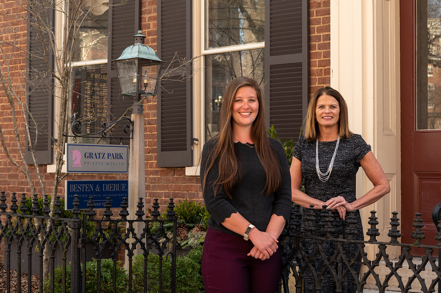 Schuck and Holley outside office