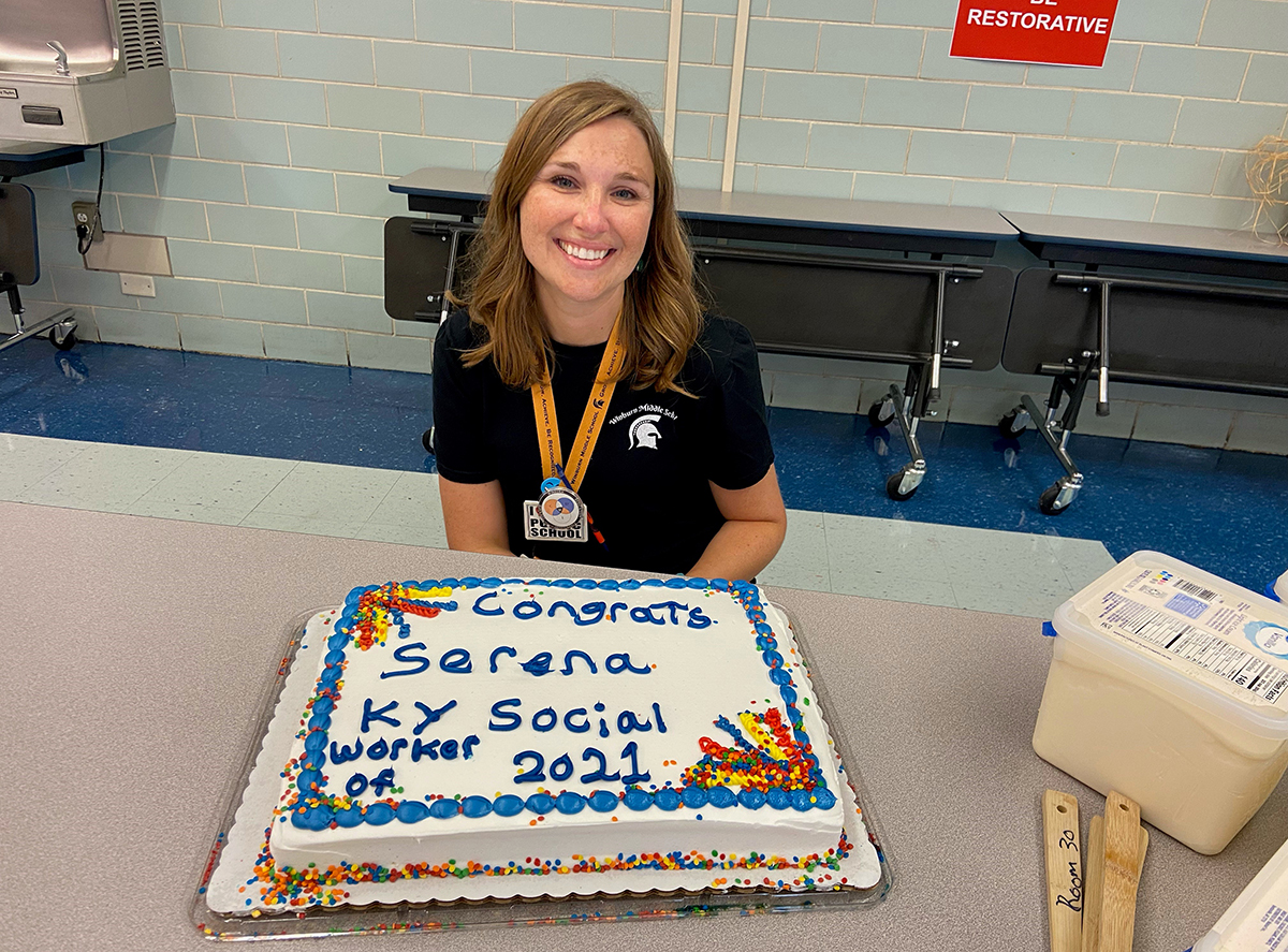 social worker with cake