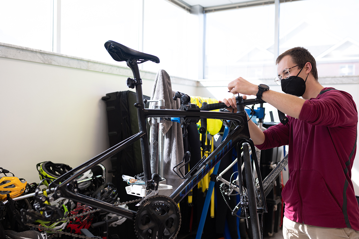 man working on a bike