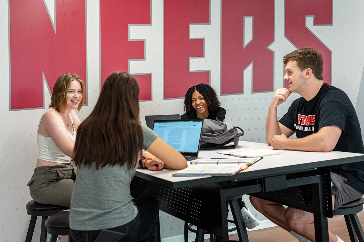 students sitting at a table