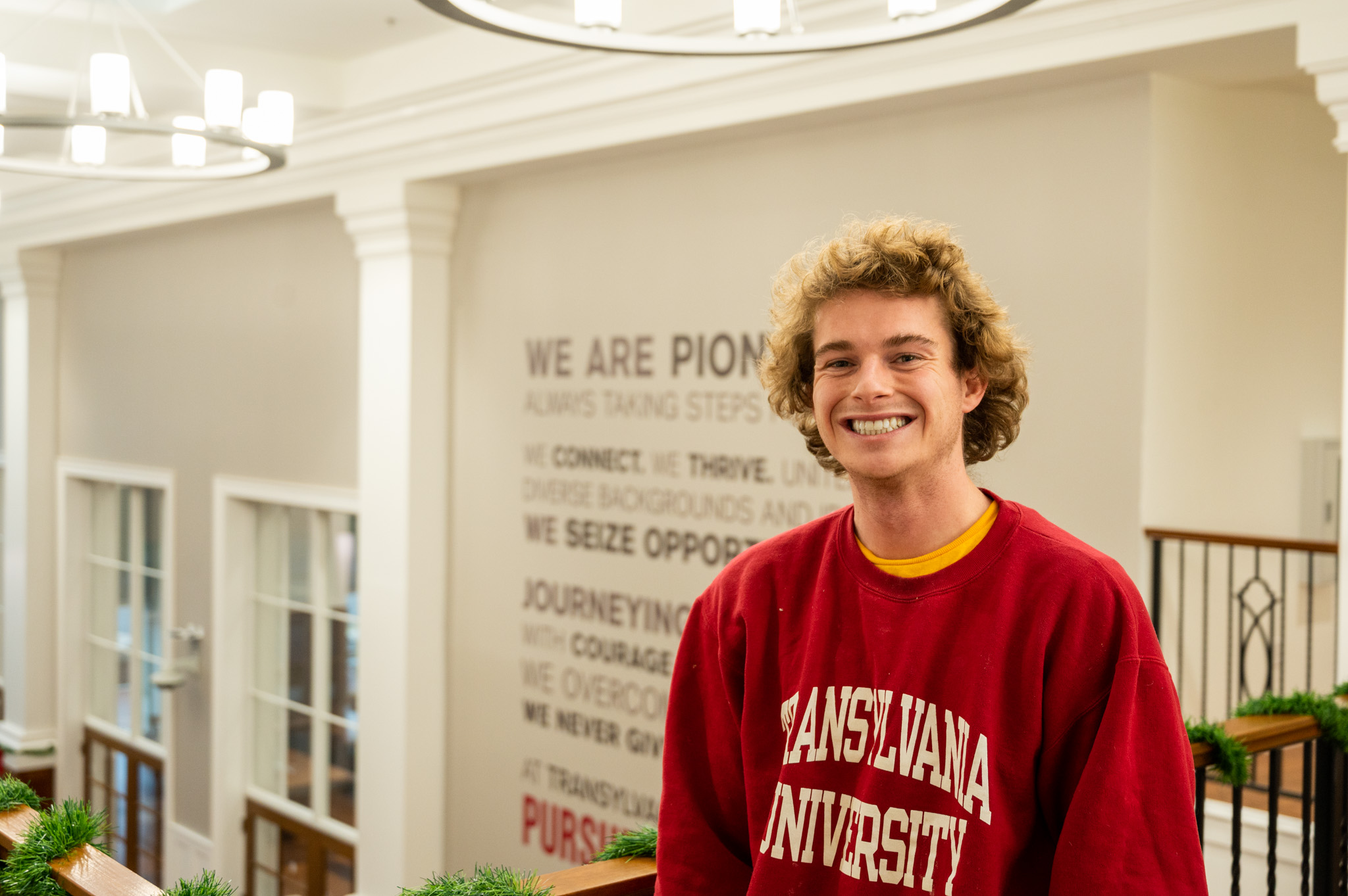 Male student smiles in the Campus Center