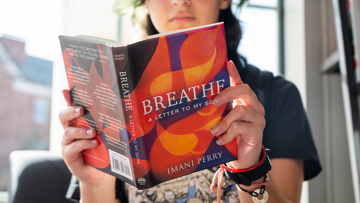 someone holding a book
