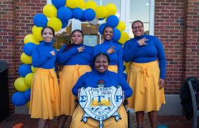 Five Transylvania students at a Sigma Gamma Rho member presentation