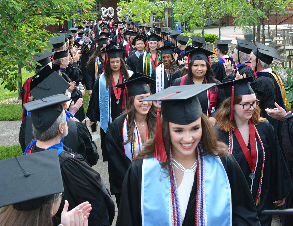 Students walking at 2023 Commencement