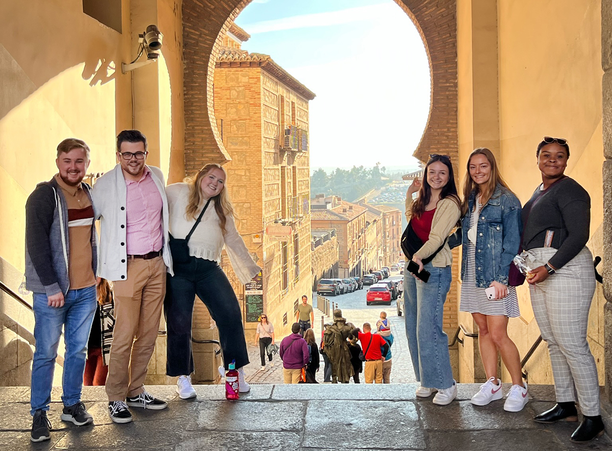 people standing in an entryway