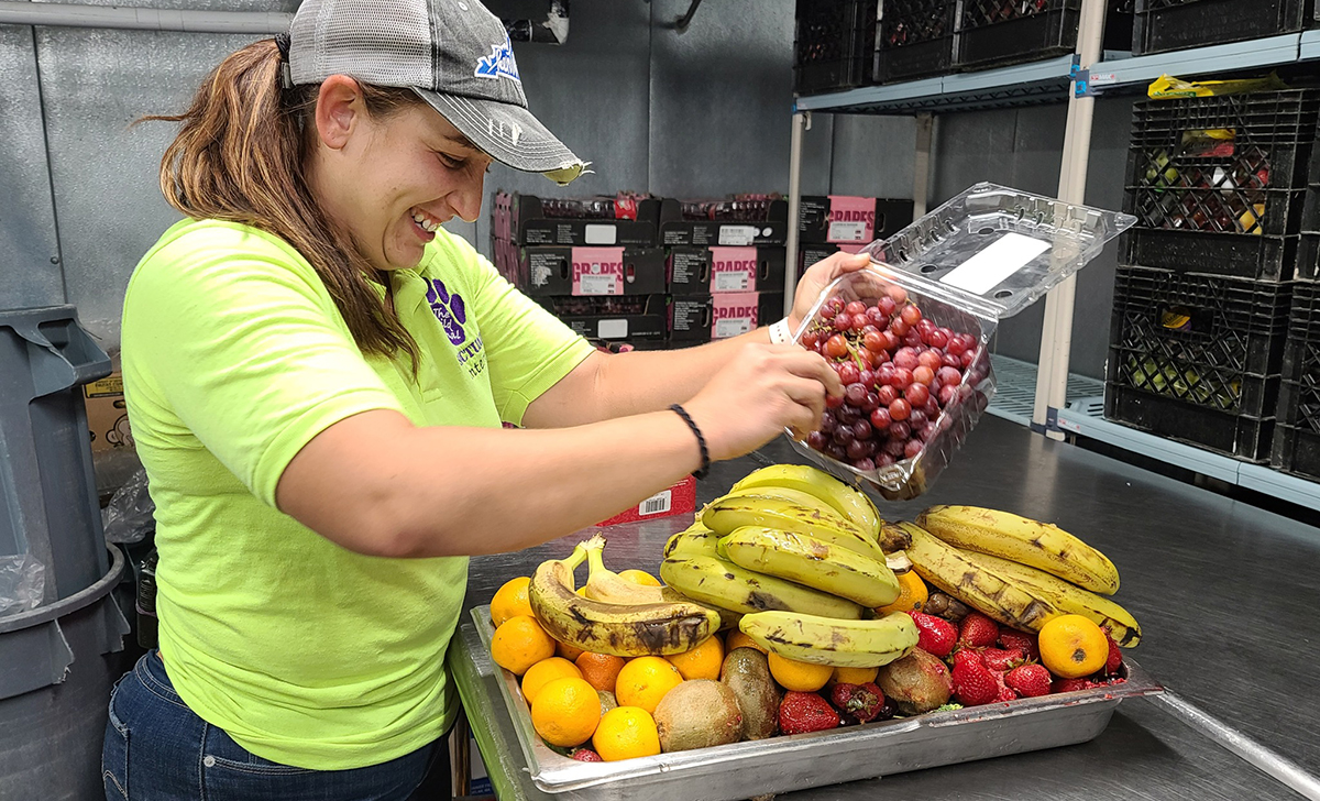 person preparing fruit