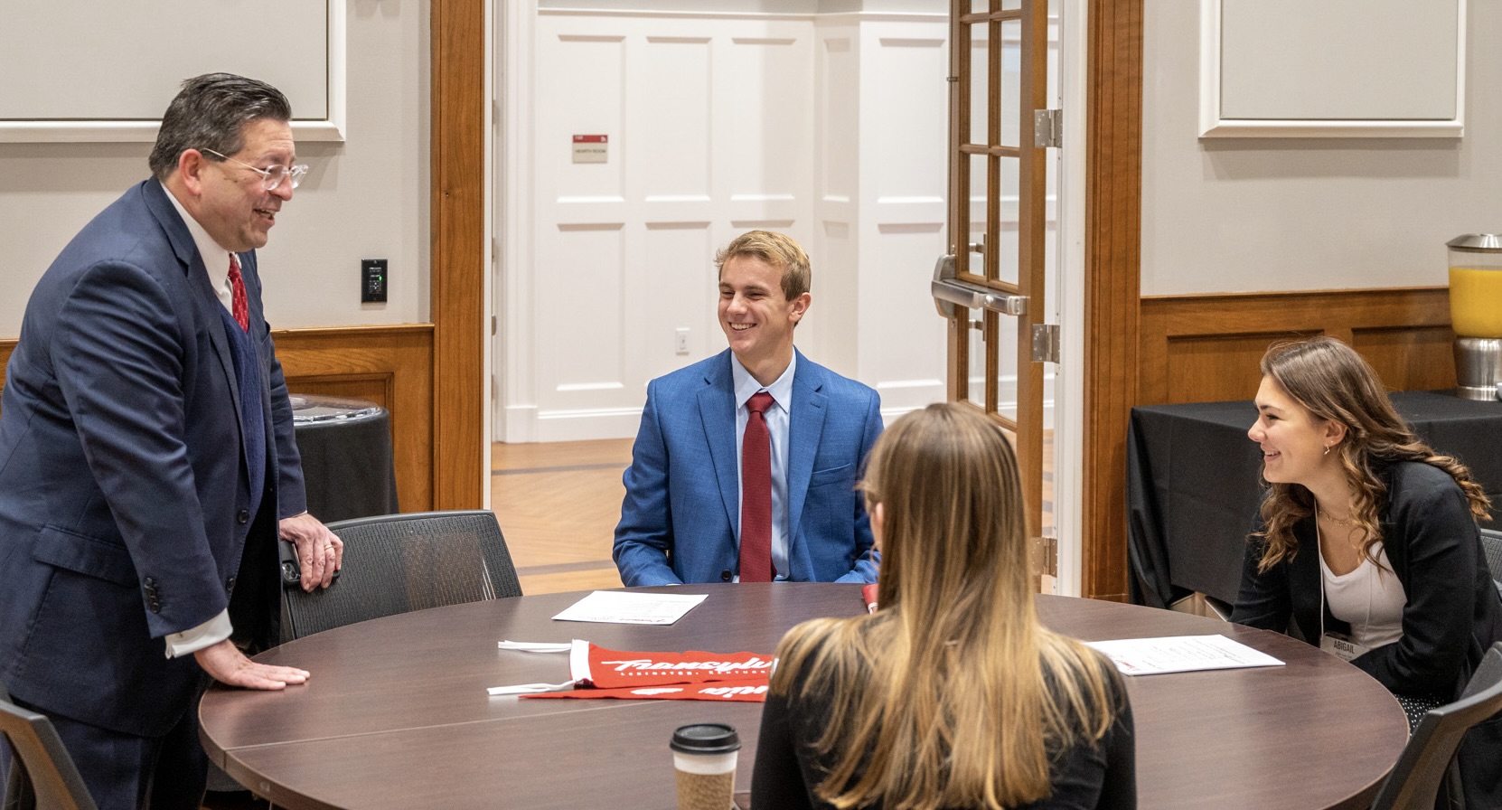 people chatting at a table
