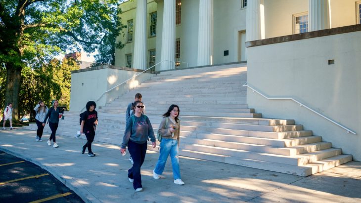 students walking on a college campus