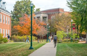 students walking across campus