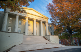 campus building with fall foliage