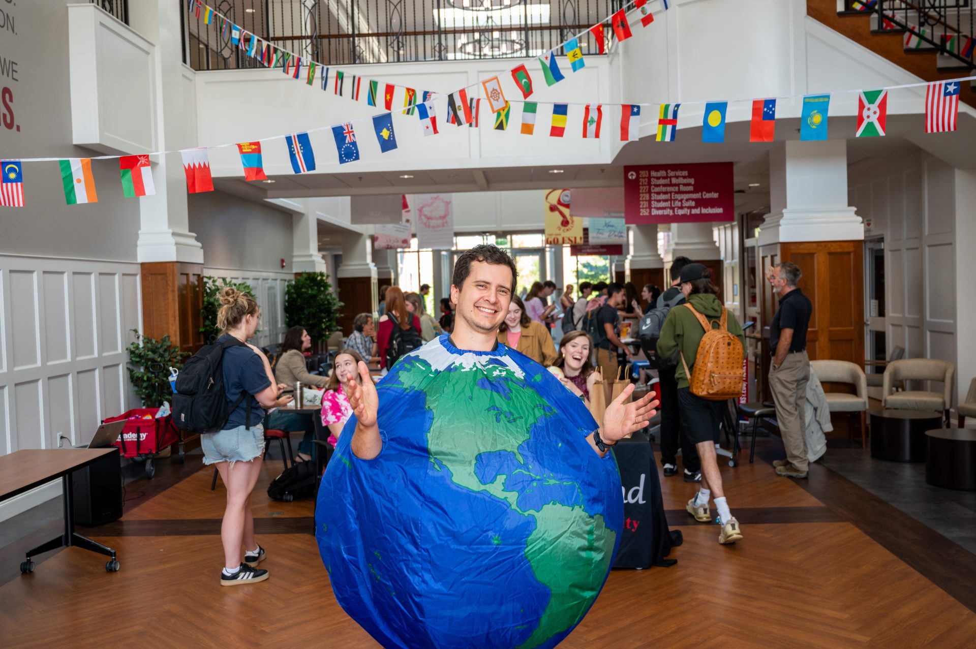 person dressed in a globe costume