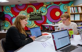 students in a writing center