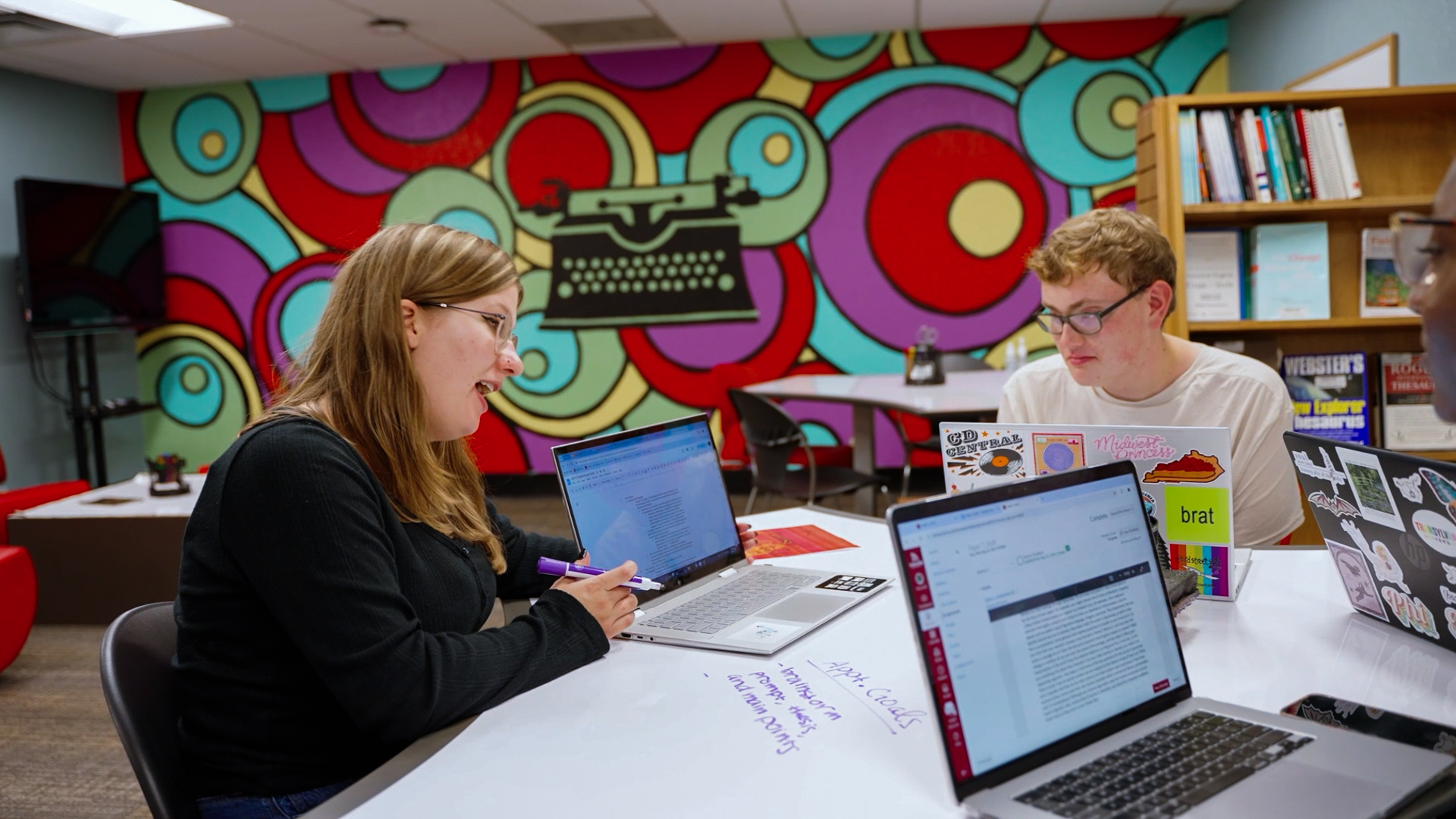 students in a writing center