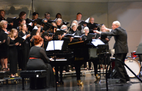 a choir performing on stage