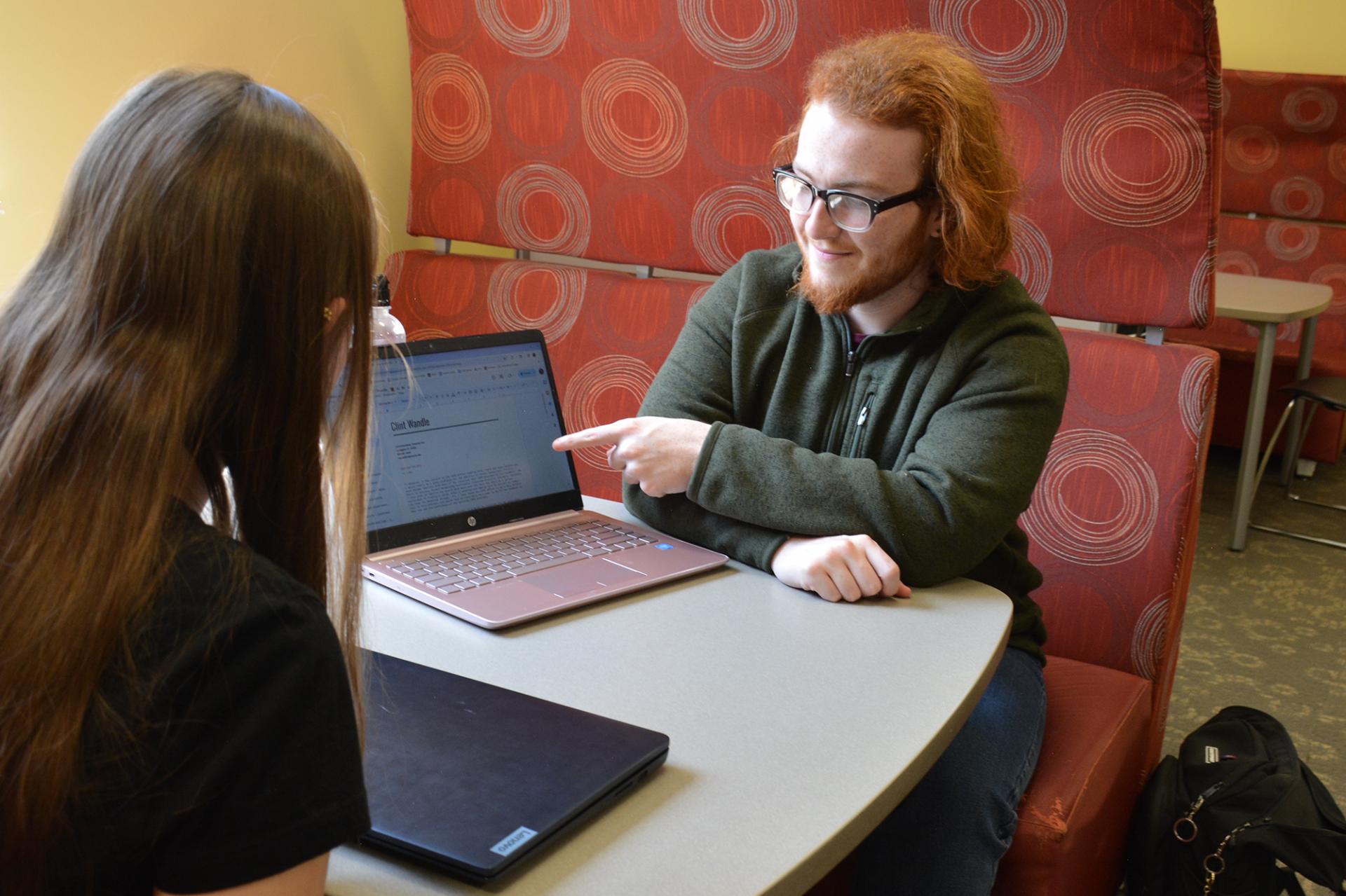 students looking at a laptop
