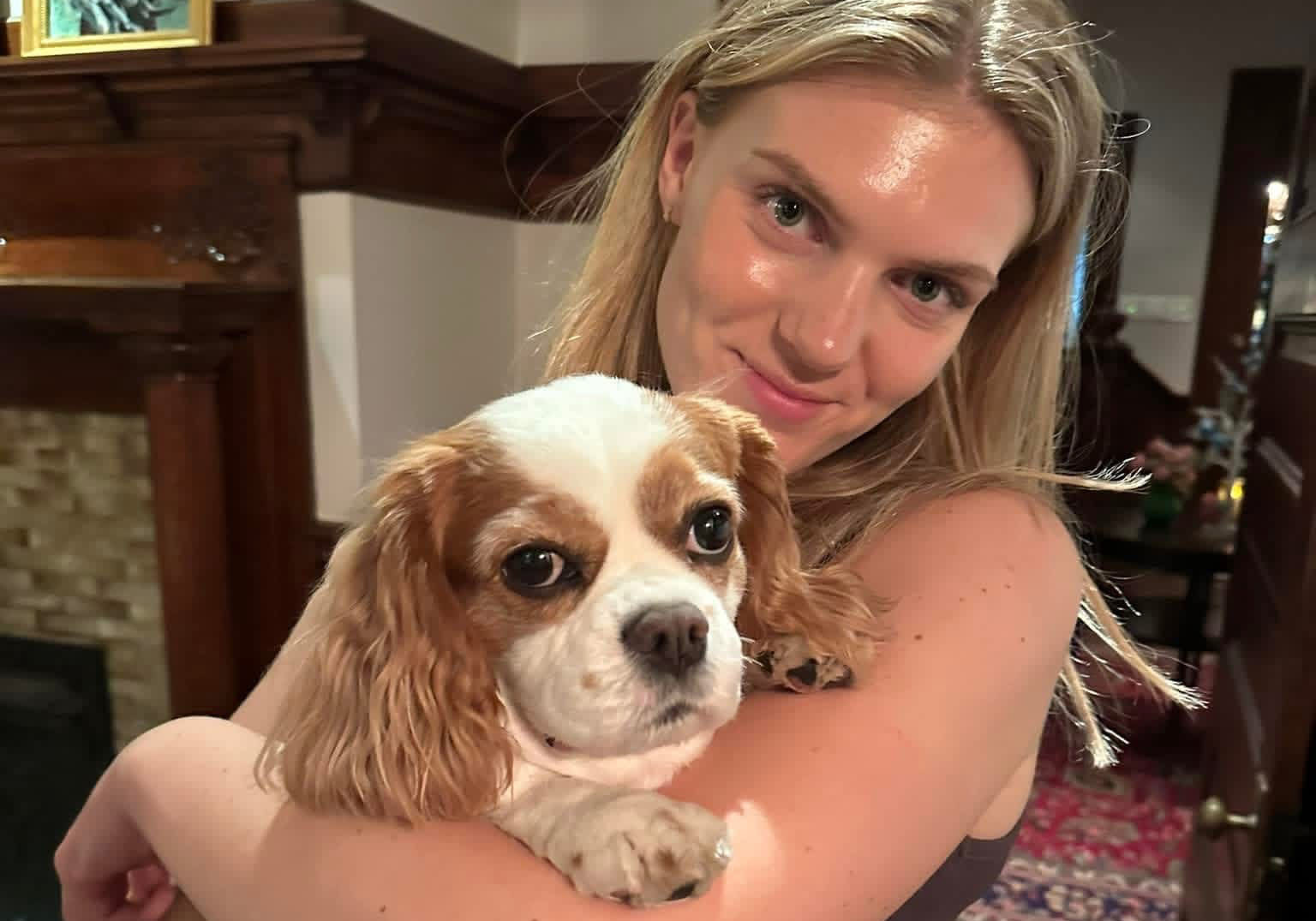 person holding a dog