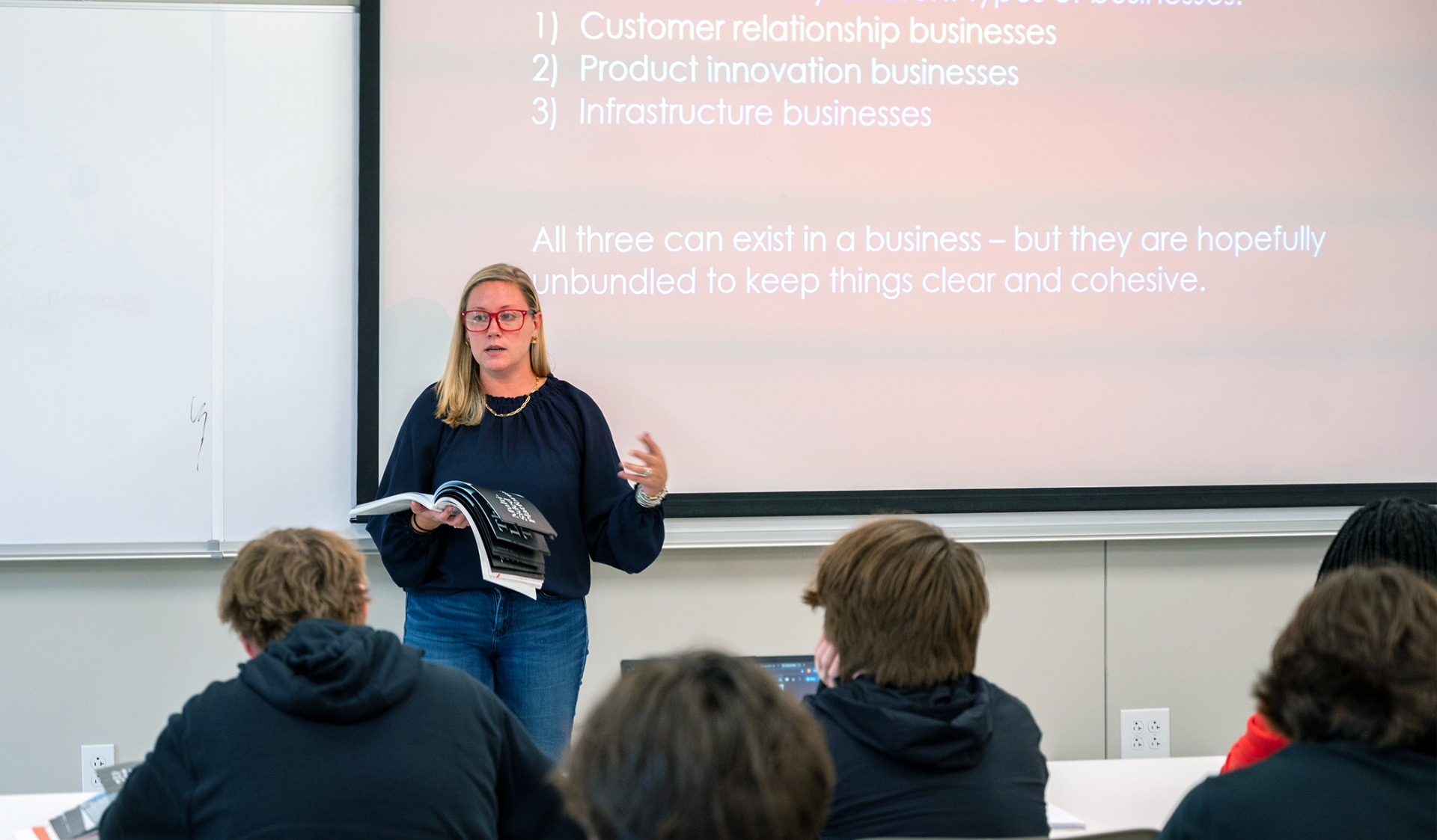 students and an instructor in a business class