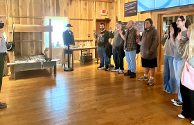 students taking an oath from a ranger