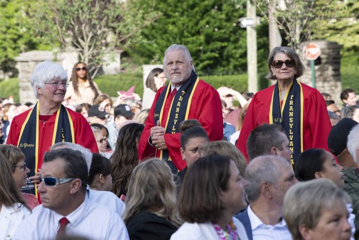 people walking at commencement