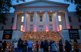 pumpkins glowing on the steps of a campus building