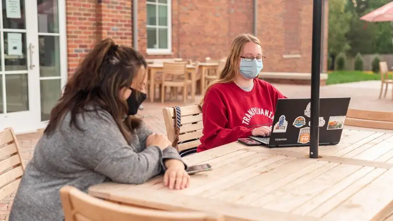 Students studying outdoors.