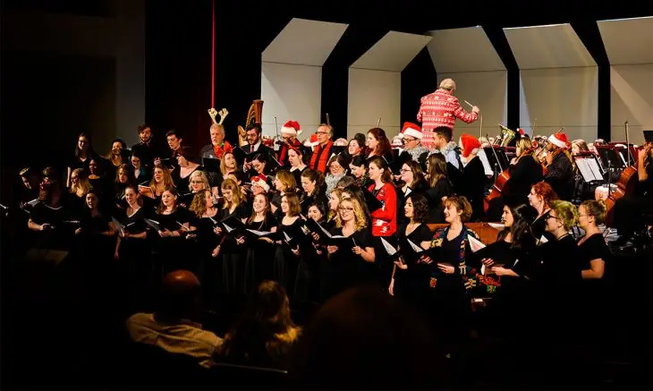 holiday concert performers on stage