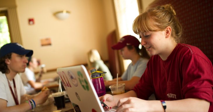 Girl in Gratz Perk with laptop
