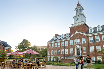 Picnic tables in front of Carpenter Academic Center