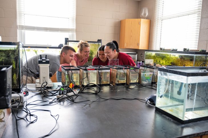 students conducting a fish research exercise