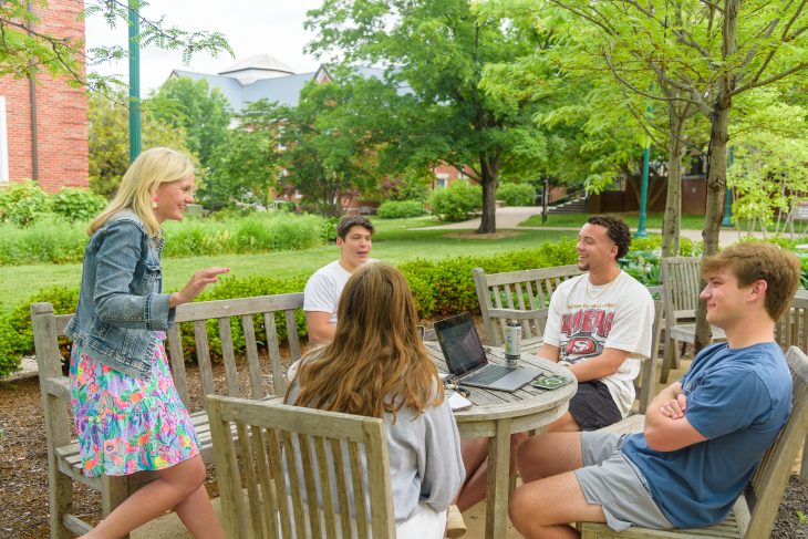 professor Christi Hayne teaching an outdoor class