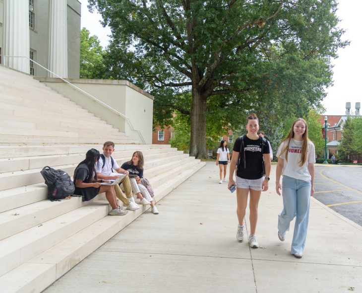 students walking in front of old morrison