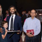 Family posing for photo