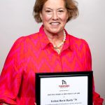 Portrait of Lisbon Davis Hardy holding award