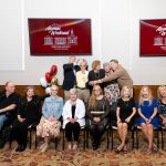 group of alumni posing for photo