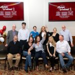 group of alumni posing for photo