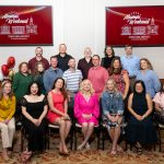 group of alumni posing for photo