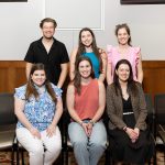 group of alumni posing for photo