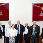 group of alumni posing for photo