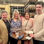 alumni posing for photo