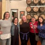 alumni posing for photo